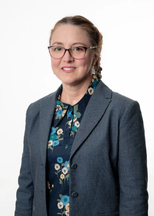 A profile picture of Karri Penley, NDIS support coordinator and psychosocial recovery coach and educator, dressed professionally